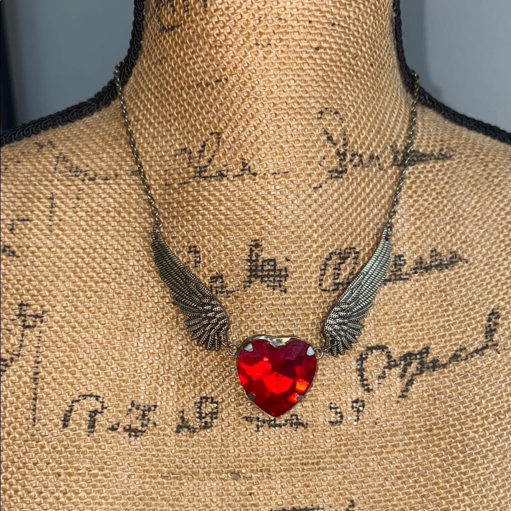Heart Necklace With Wing Accents